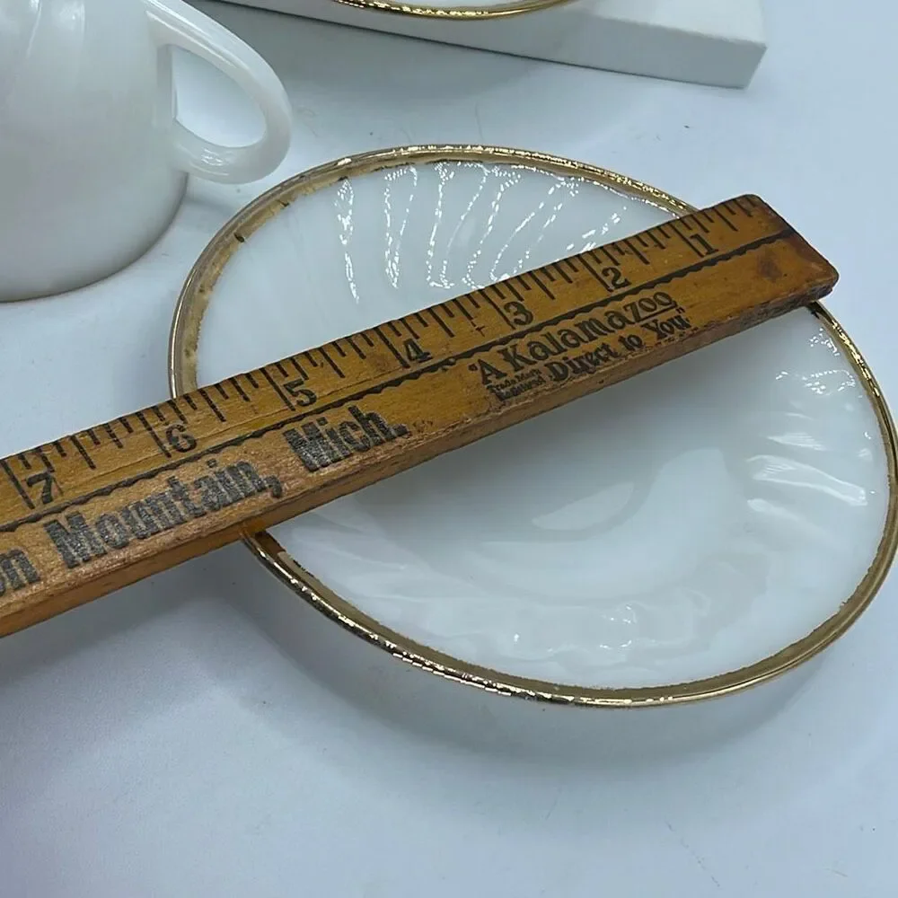 Set of 2 Fire King milk glass swirl pattern cup & saucers.